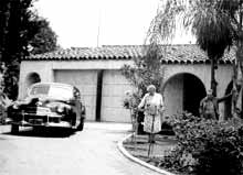 Alma and Werfel in front of their house in L.A.