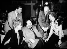 Alma and Werfel at the set of "The Song of Bernadette"with Claudette Colbert and Errol Flynnt